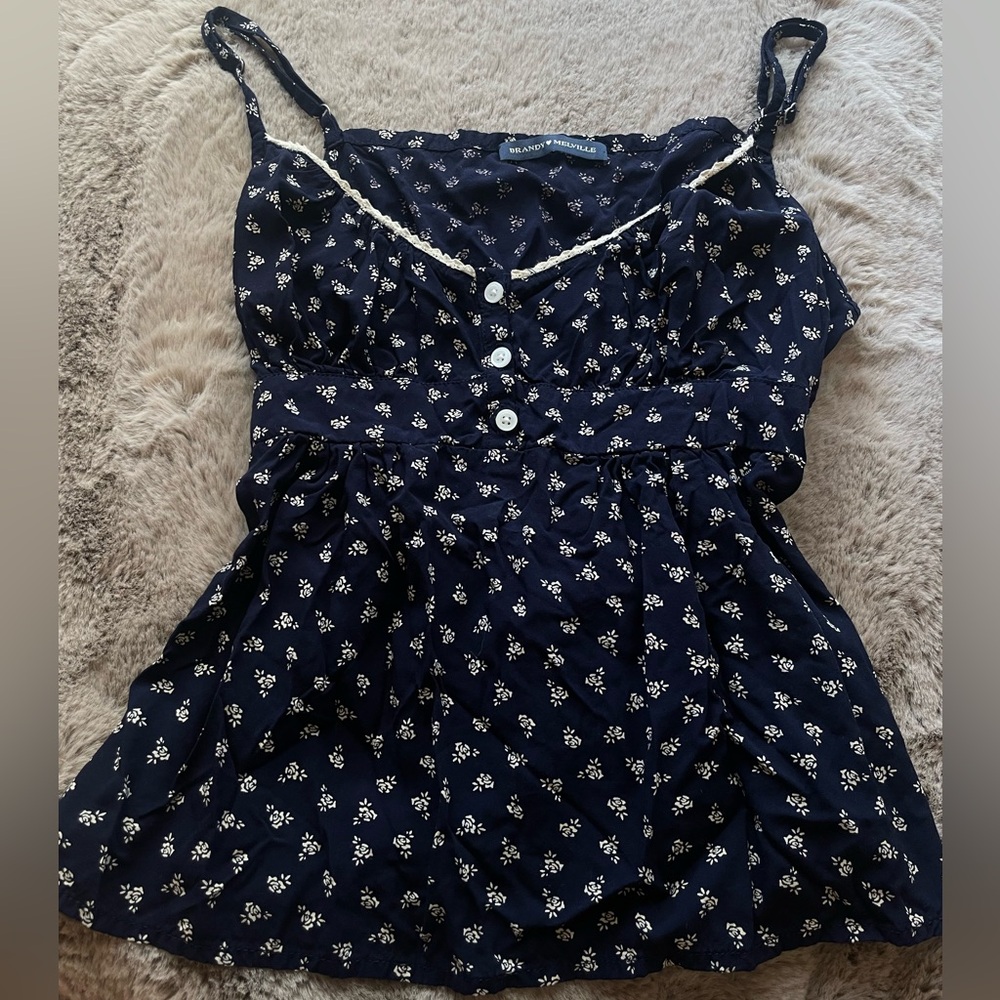 Navy blue floral flow top from Brandy Melville, floral print and cream roses.